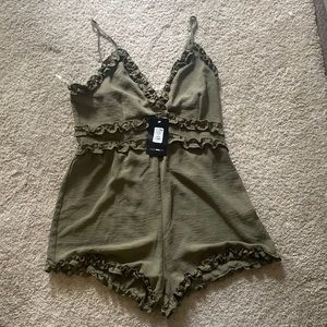 Olive colored ruffle romper - brand new with tags